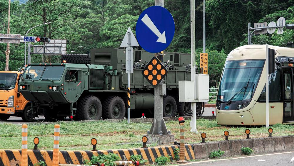 空軍防空部隊機動。（軍聞社記者陳軍均攝）